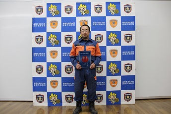 表示証を持つ神山さん