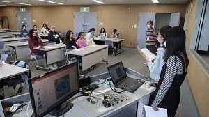 写真：座間パズル発表の様子