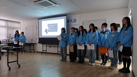 写真：青少年健全育成大会での受入報告の様子